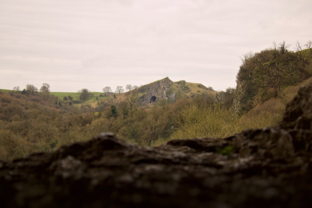 View across manifold valley towards Thors cave from nan tor cave