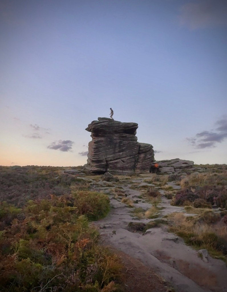 man climbing mother cap