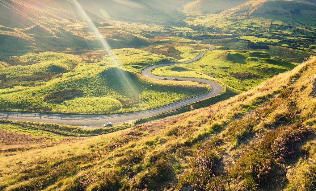 Scenic Twisty Road of Edale Valley in Peak District National Park, UK