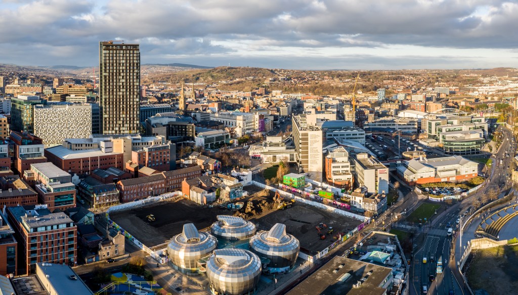 Aerial view of Sheffield city centre skyline at sunset
