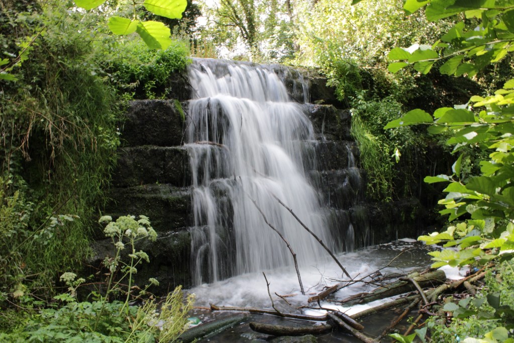 Weir waterfall in the woods behind Roche Abbey, Rotherham, South Yorkshire